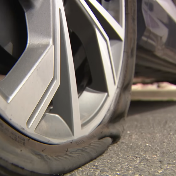 cars get flat tires after screws spill on highway