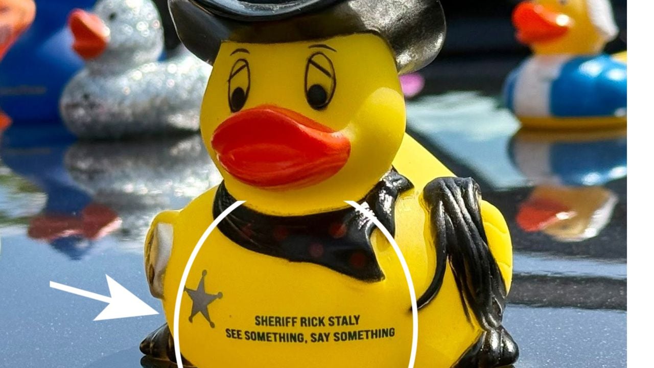 Sheriff-themed rubber duck with a sheriff's badge design reading "See Something, Say Something" and "Sheriff Rick Staly."