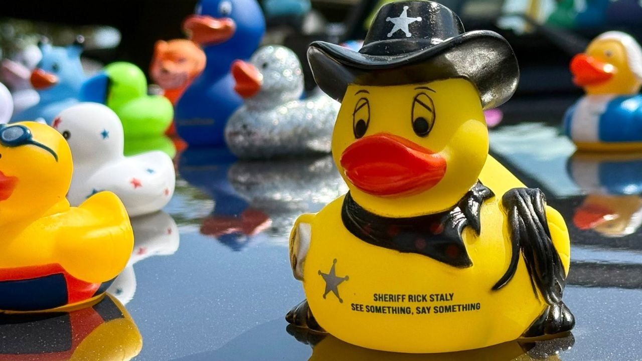 Sheriff-themed rubber ducks handed out during a Florida Jeep show for the Duck Duck Jeep tradition.