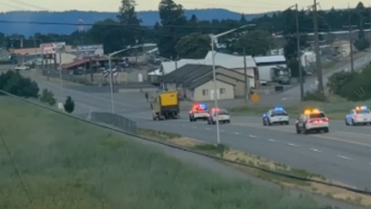 Stolen Franz bread delivery truck drives down a road during a police chase in Idaho.