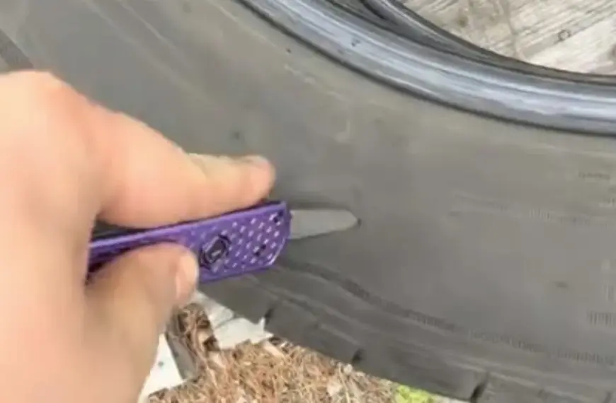 Mechanic slashing used tires