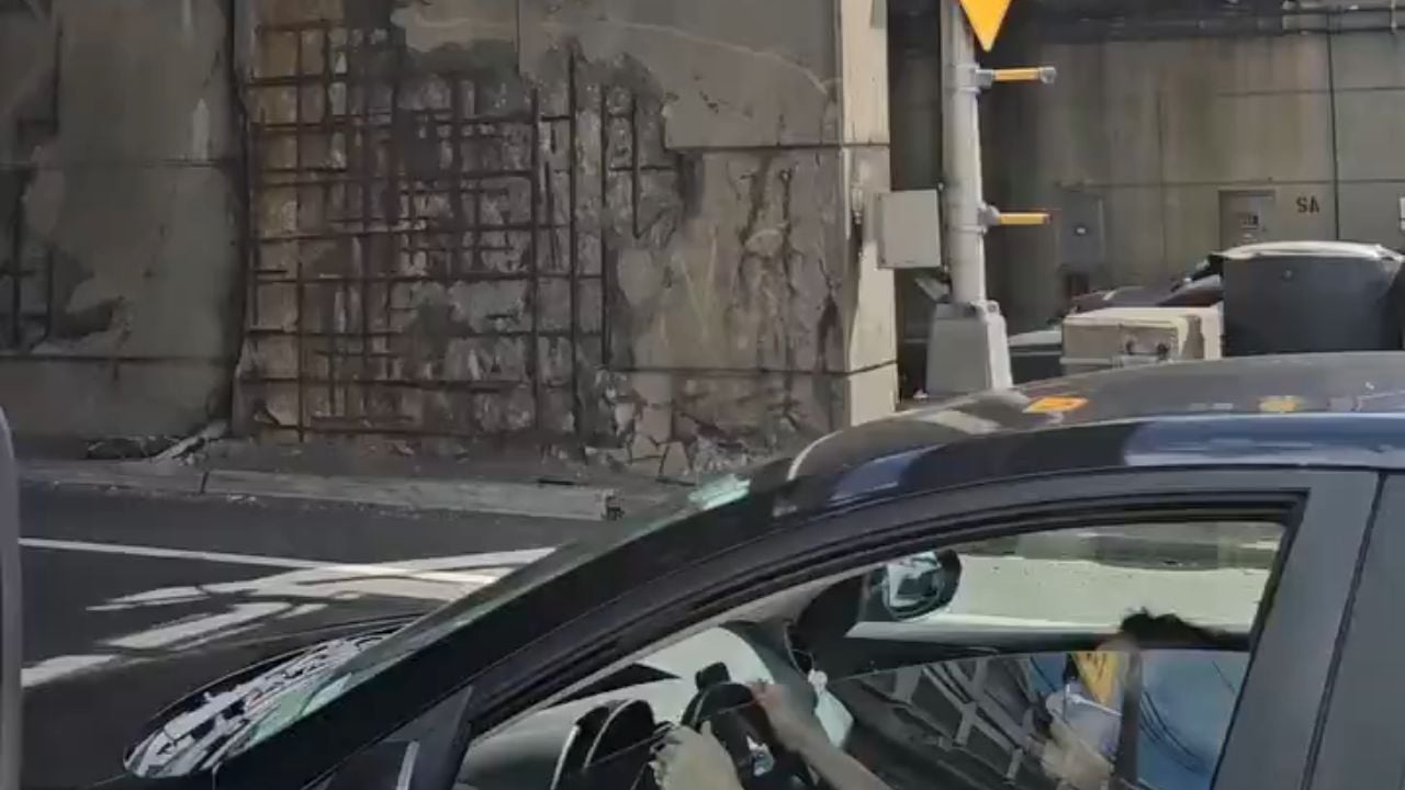 Driver Films Exposed Rebar Where Concrete Already Fell on Cars.