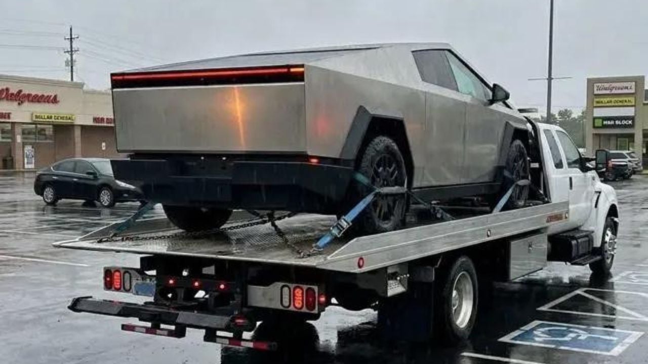 Cybertruck driver says tow happened during prescription pickup.