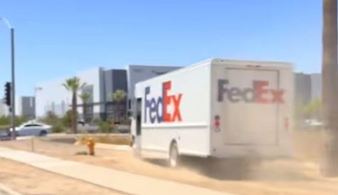 fedex truck going through sand
