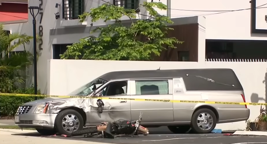 man crashes into hearse and dies