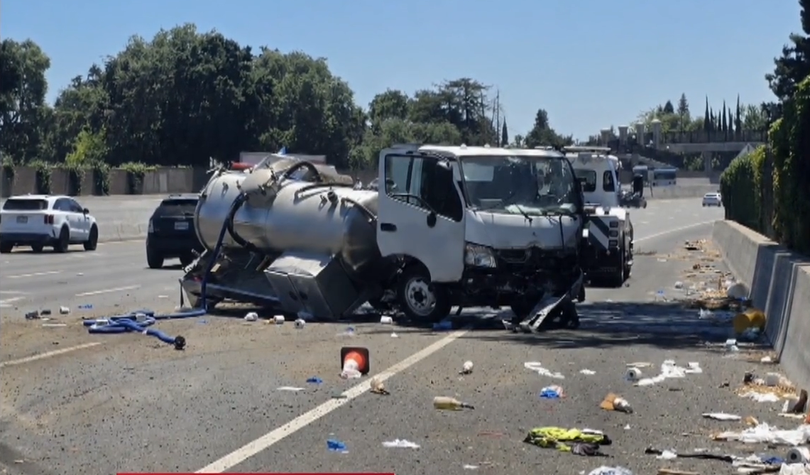 sewage tank spills on street