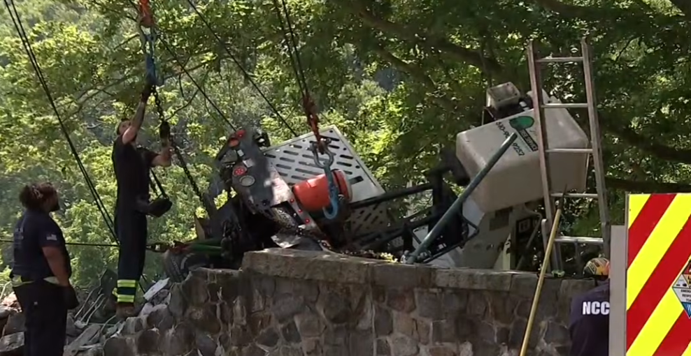 truck driver jumps from falling service vehicle