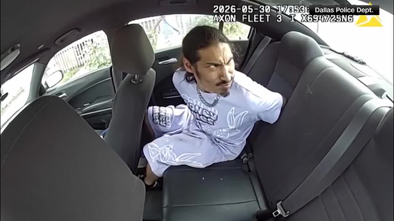 Handcuffed Man Climbed Into the Front of a Police Cruiser.