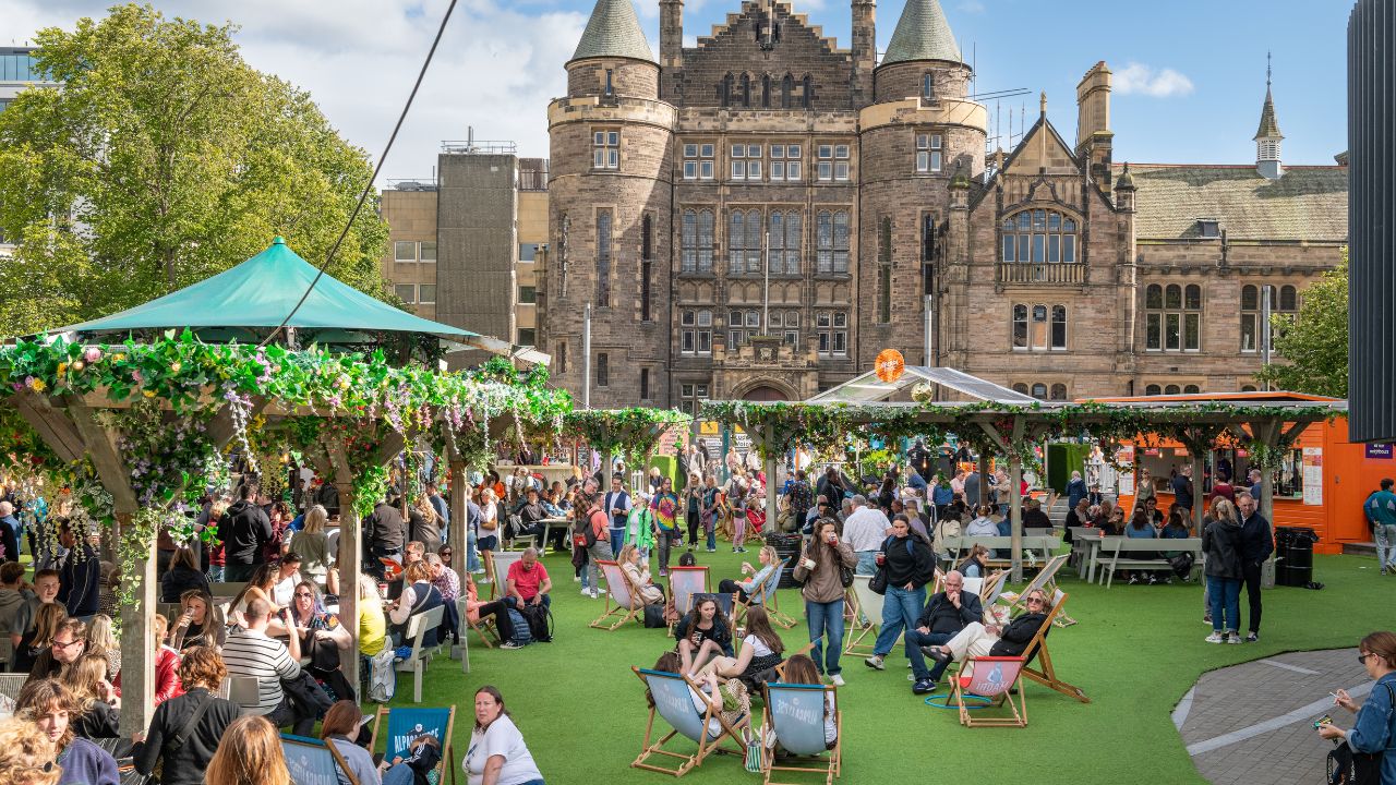 Crowds enjoying the Edinburgh Festival Fringe in summer.