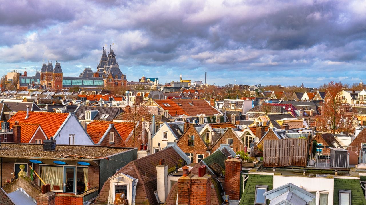 Amsterdam cityscape from De Pijp at dusk.