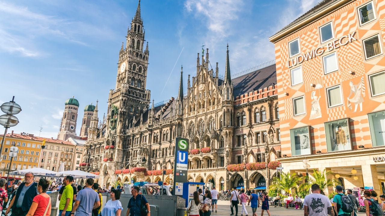 People walking around Marienplatz in Munich, Germany.