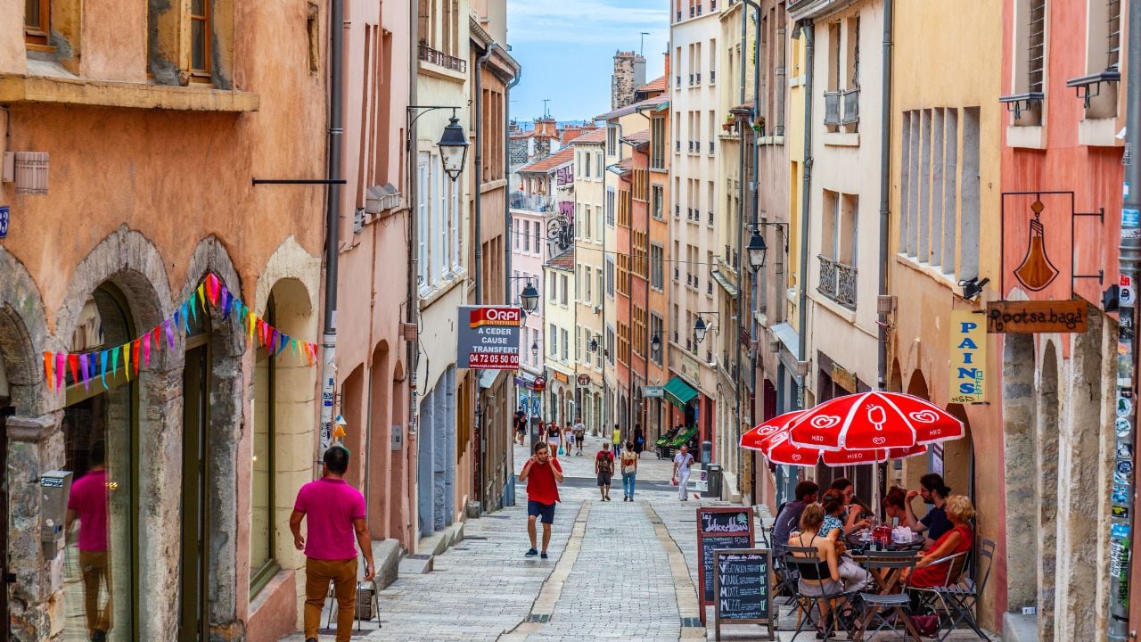 People walking through the old town of Lyon, France.