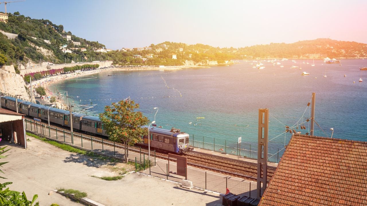 Train traveling along the French Riviera coast.