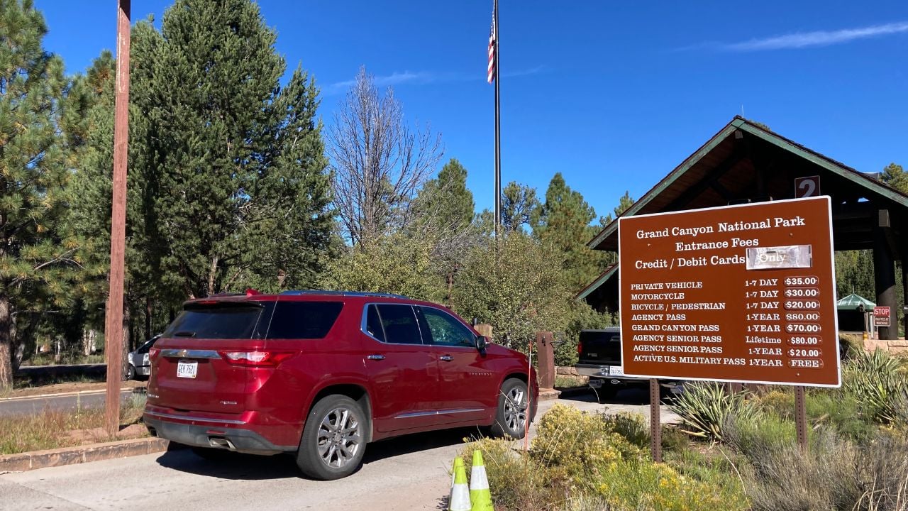 Cars waiting at the Grand Canyon National Park South Rim entrance booths in Arizona