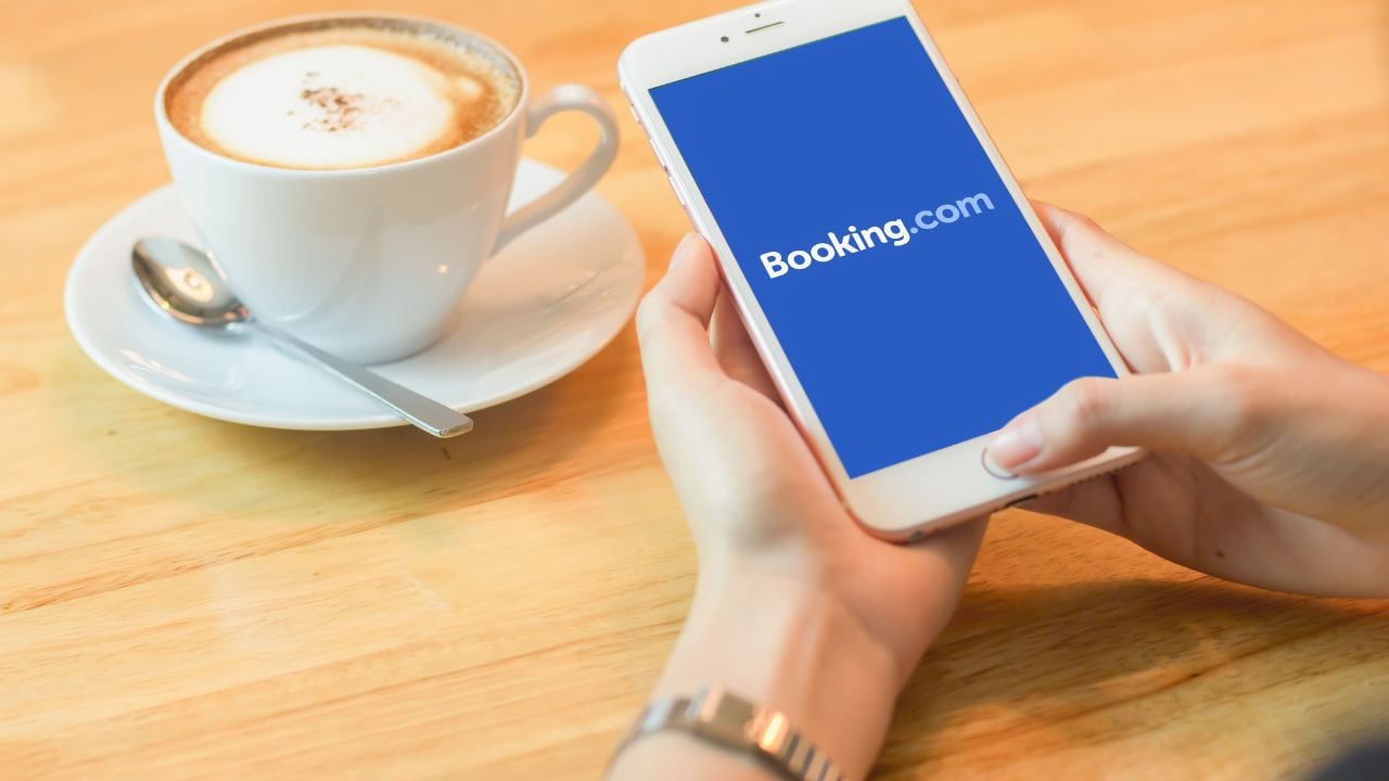 Booking.com logo displayed on a smartphone screen