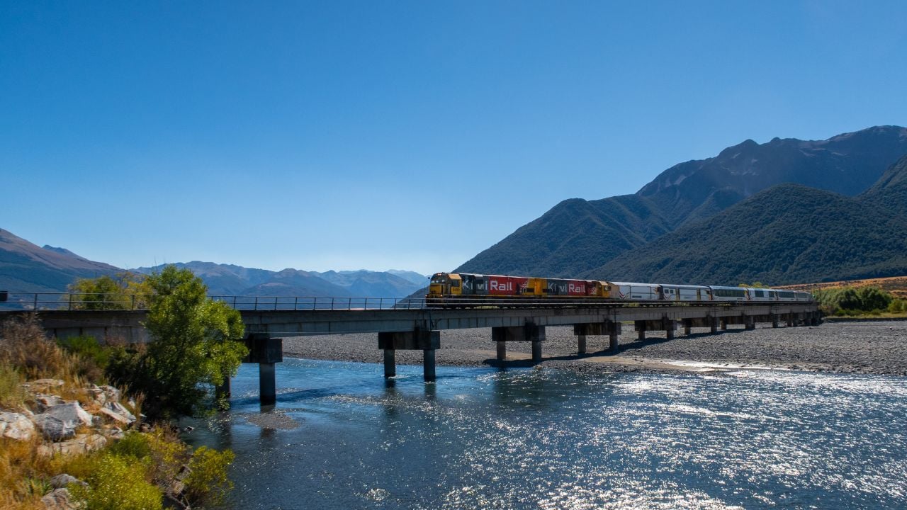 TranzAlpine train crossing the Waimakariri River near Arthur's Pass in New Zealand