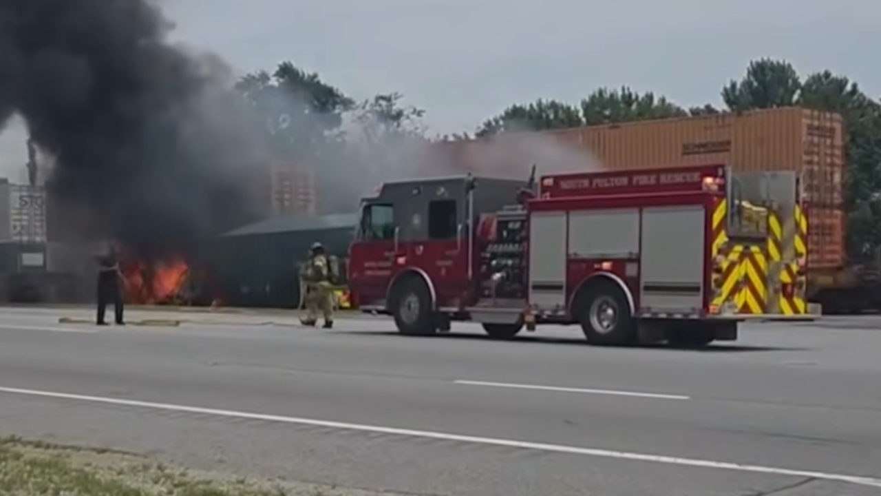 truck gets stuck on tracks and hit by train