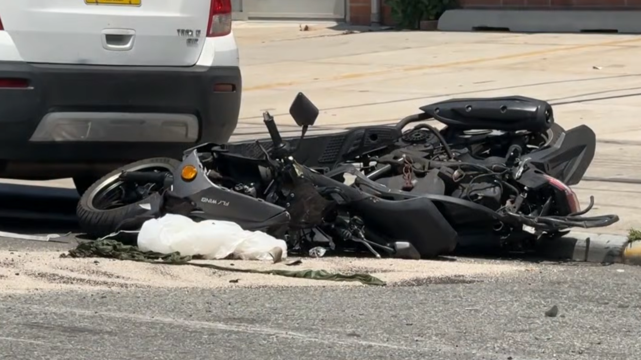 moped hits car door