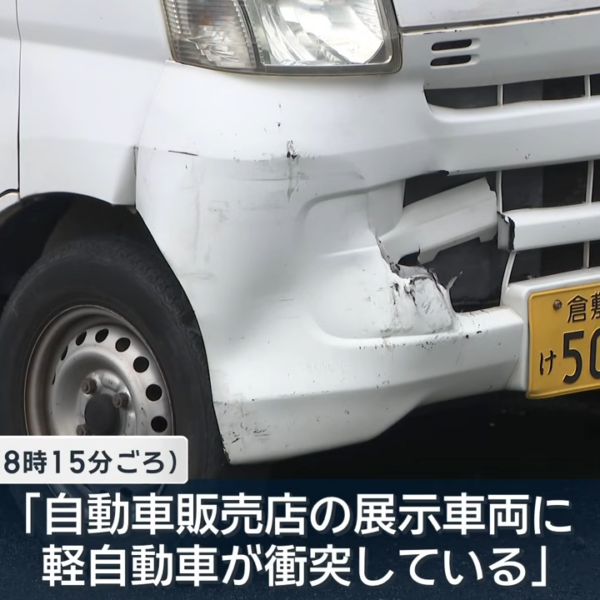 kei car crashes into dealership and driver dies