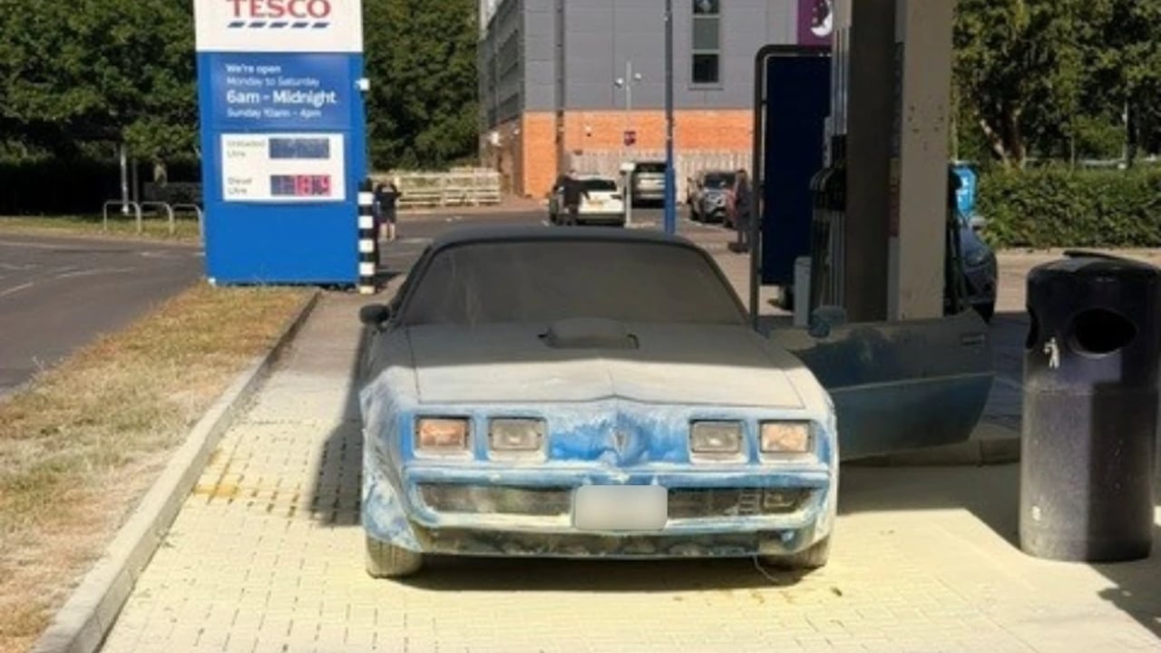 Car in flames at petrol station