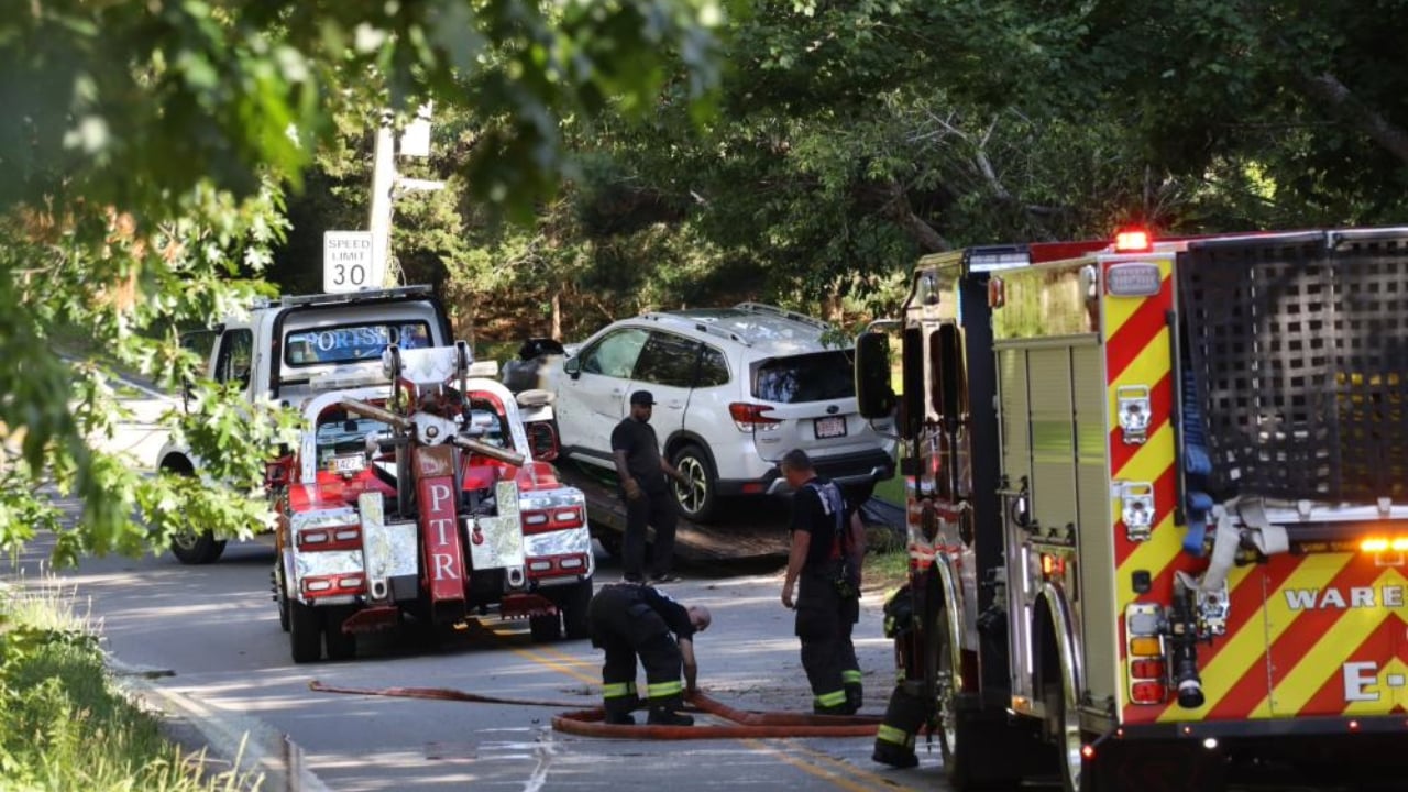 Wareham teacher rescues woman from burning car