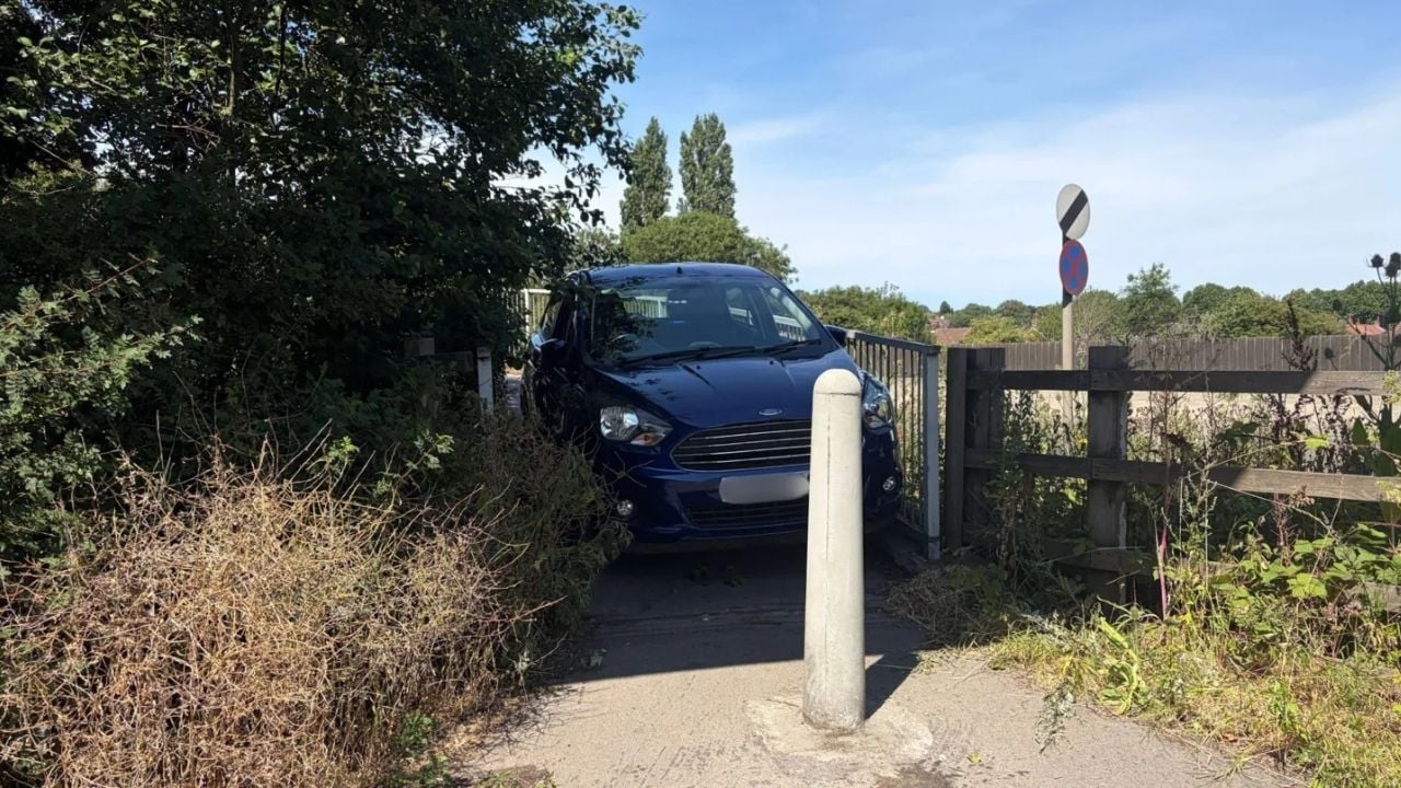 Ford stuck on footbridge