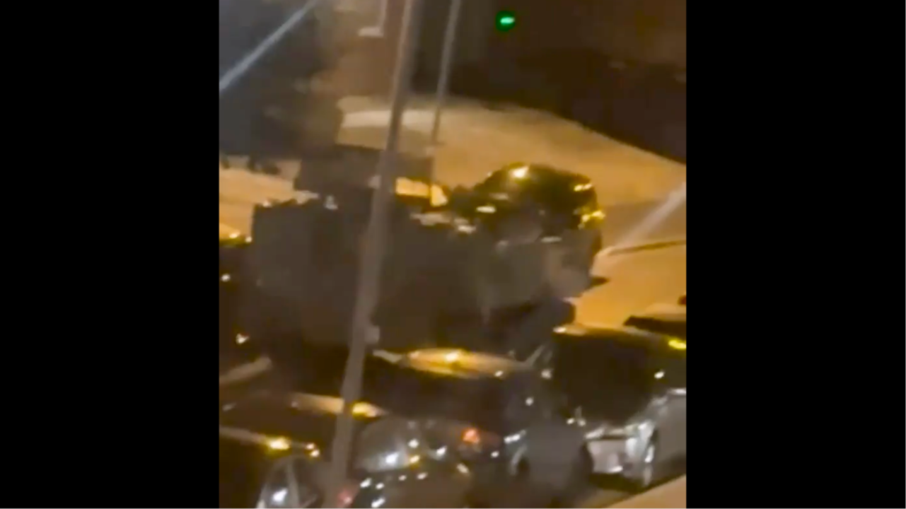 Tank Damages Cars