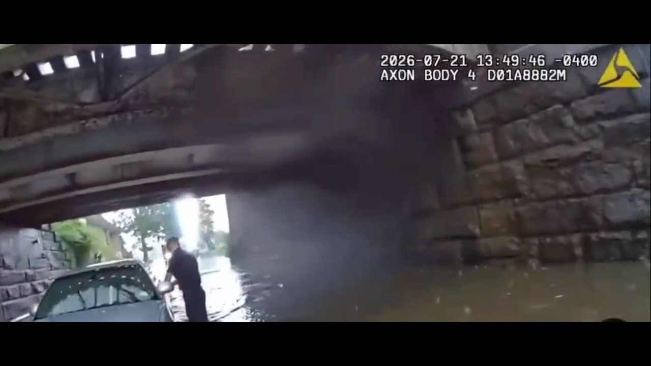 Officers Save Occupants From Flooded Vehicle as Warning Issued