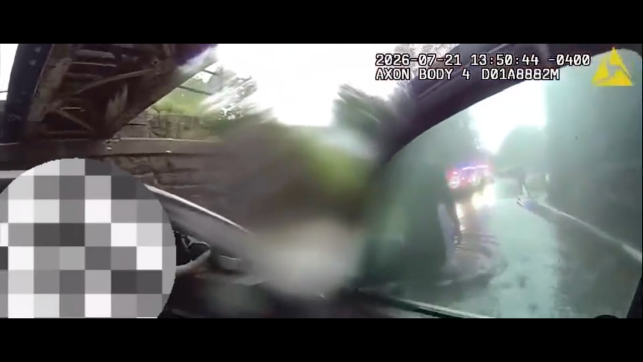 Officers Save Occupants From Flooded Vehicle as Warning Issued