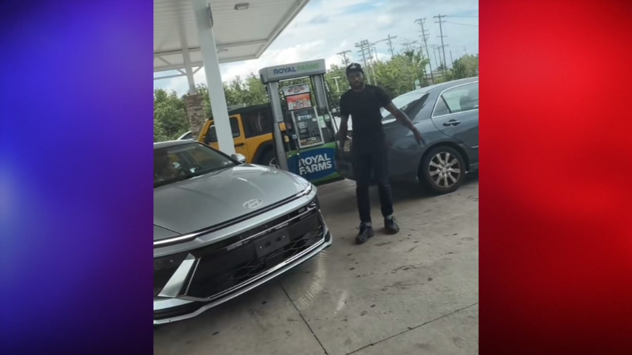 man trying to steal gas