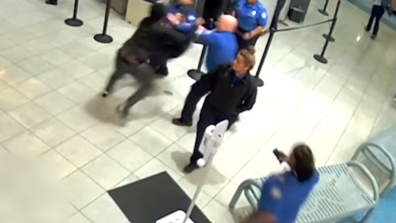 man attacks security at airport