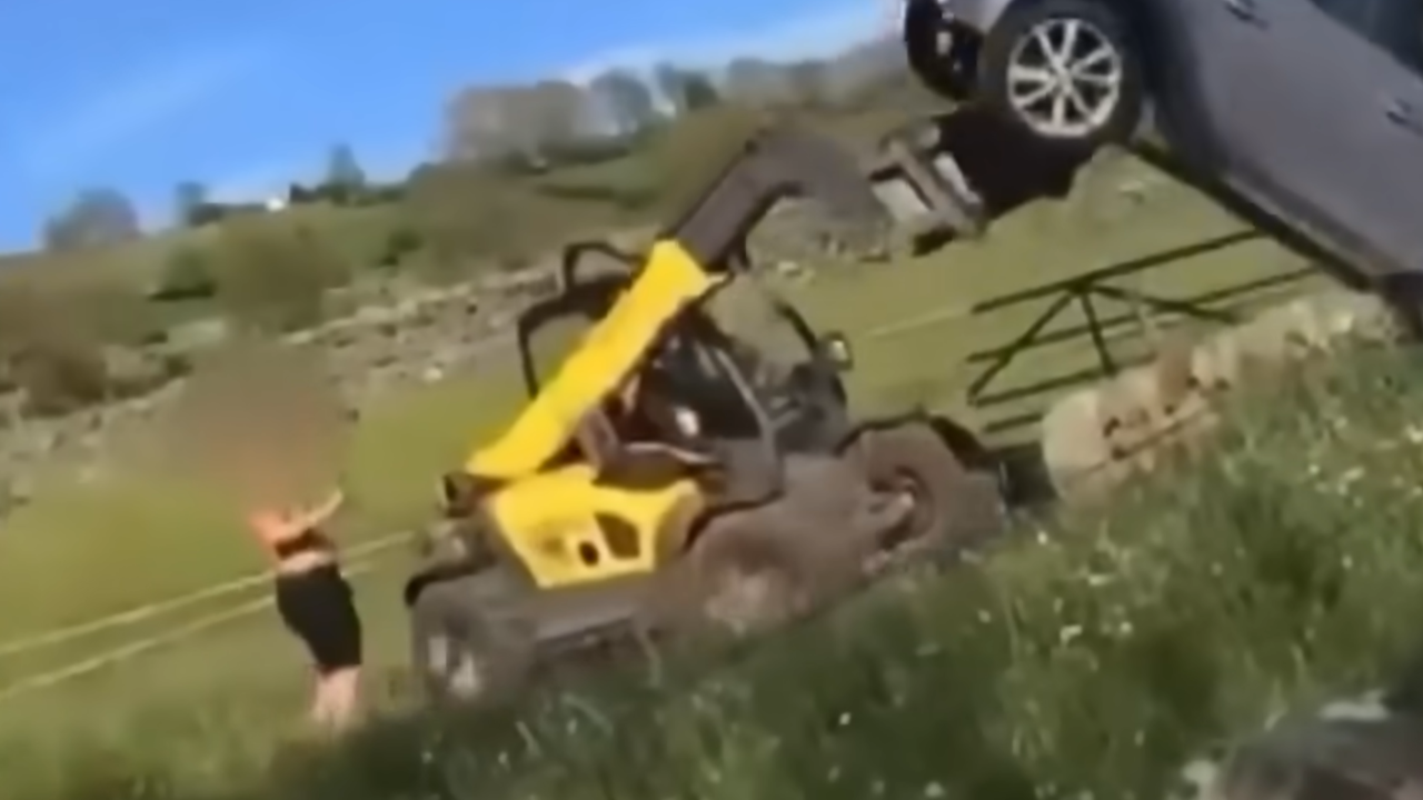 farmer flips over car