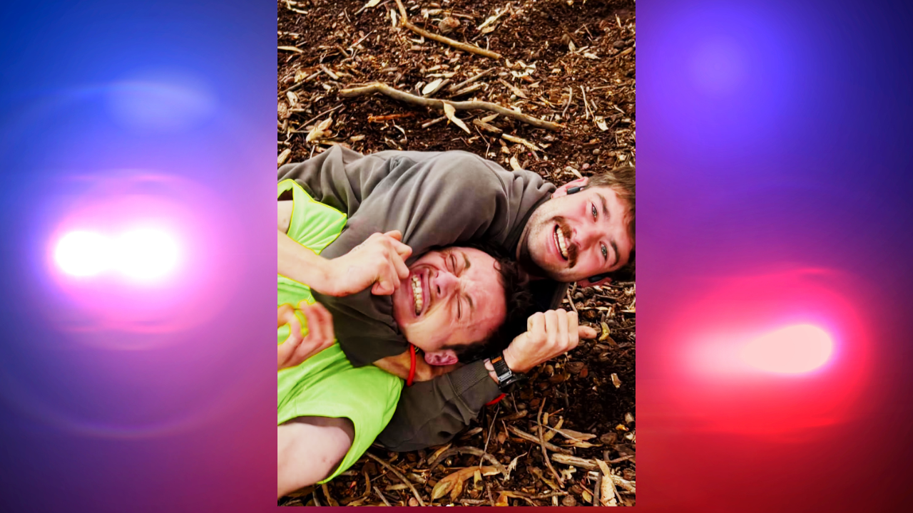 man puts carjacker in headlock