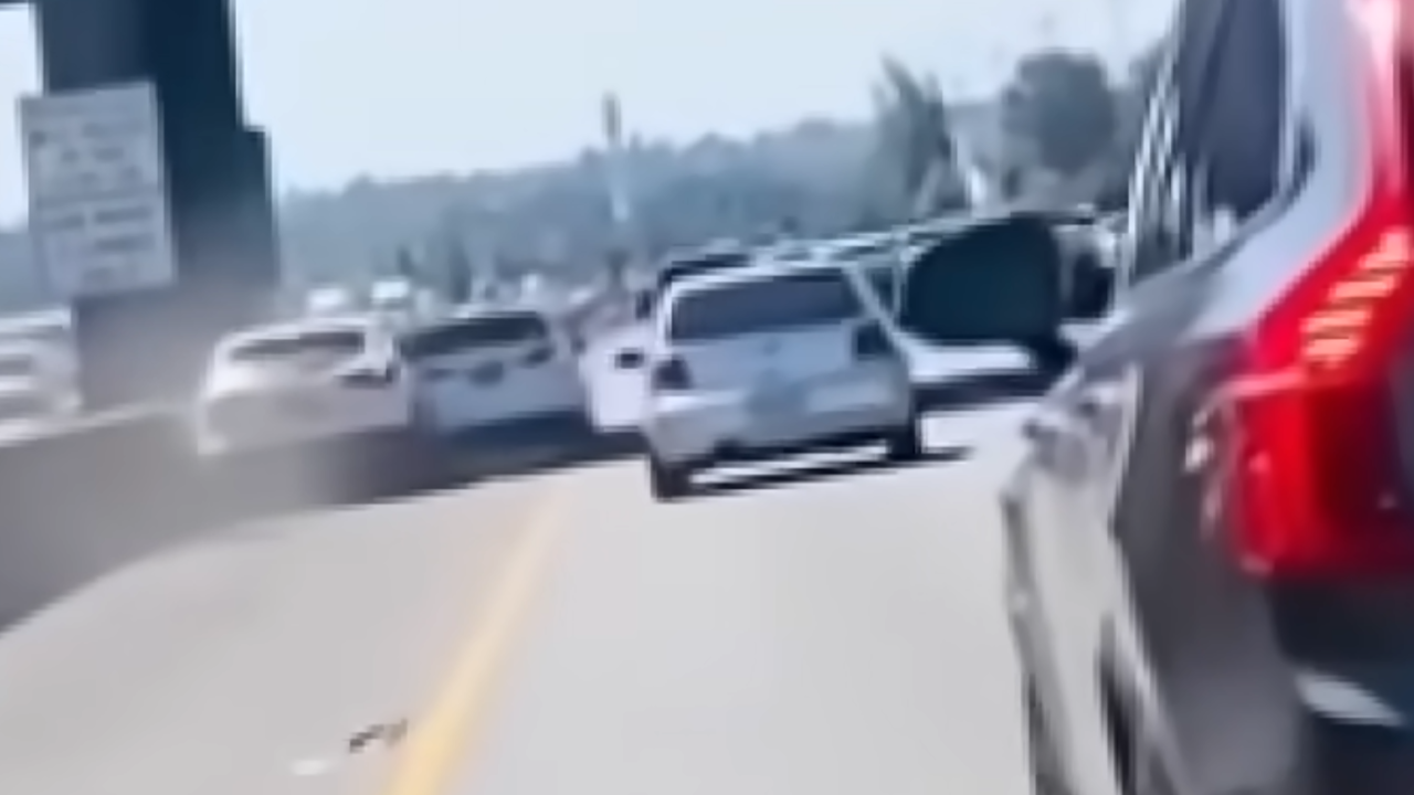 kia driver stops SUV