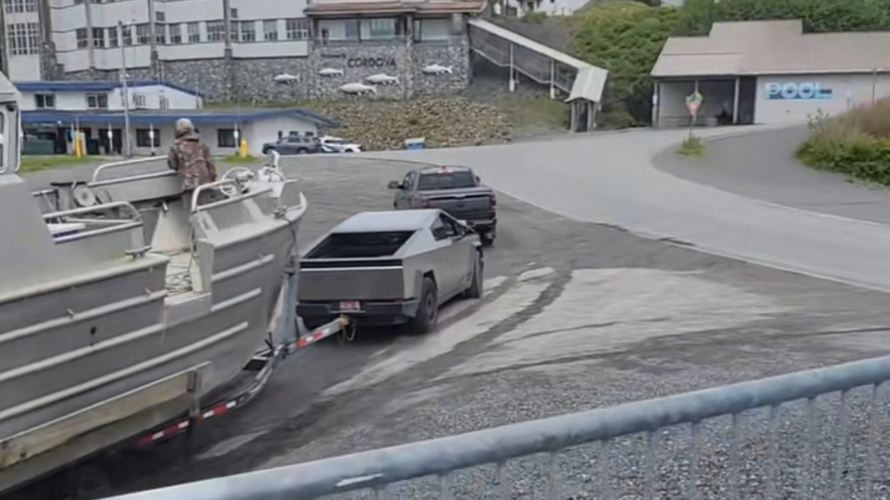 cybertruck pulling boat meme