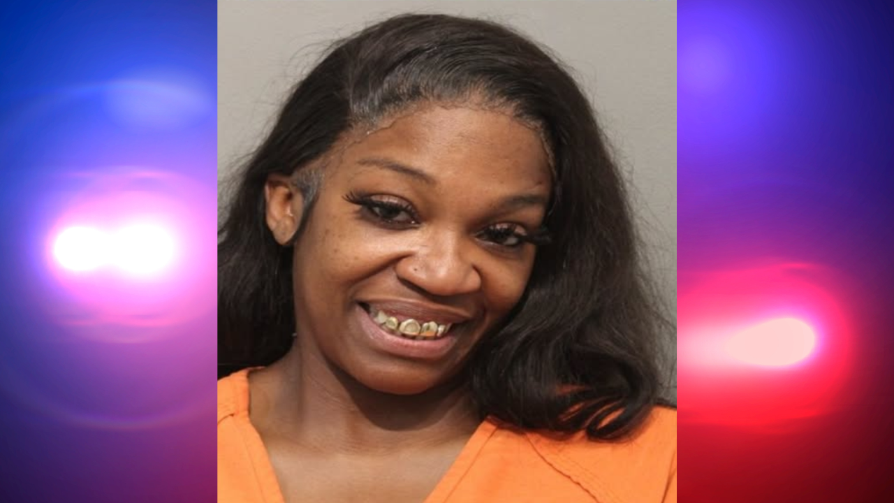 woman with gold grills arrested for assaulting cop