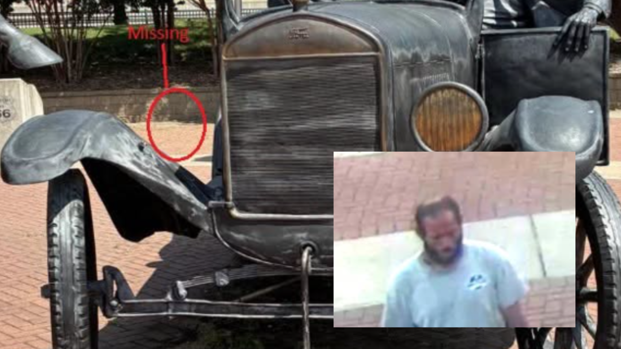 tin lizzie statue broken