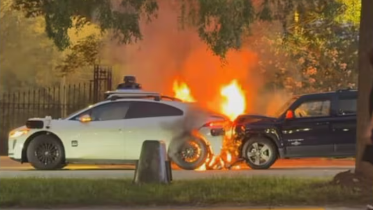 waymo catches fire in crash