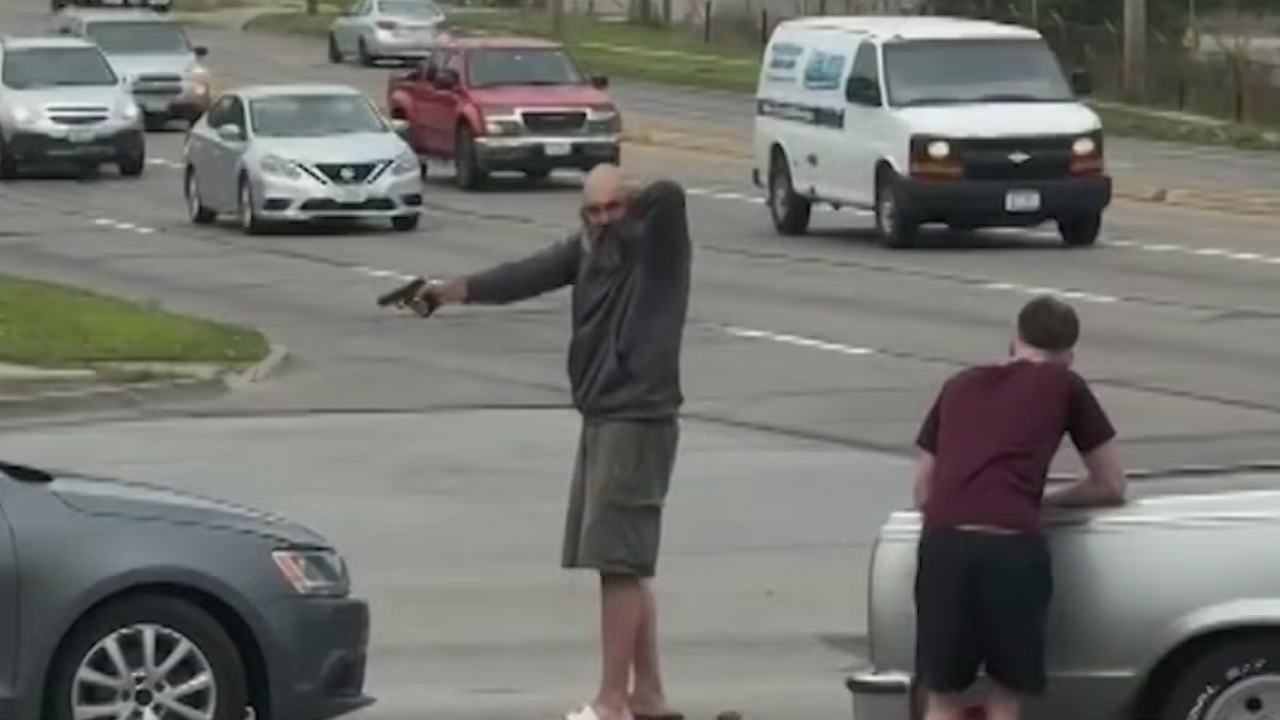man arrested for pointing gun at teens after crash