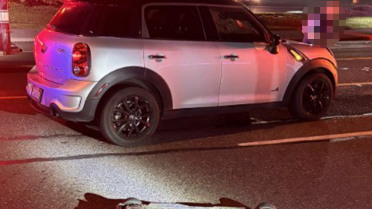 mini cooper hits skateboarder