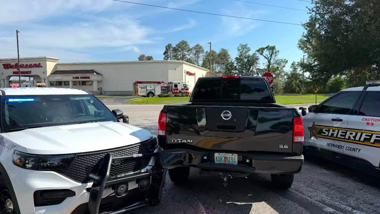 man rams police cars