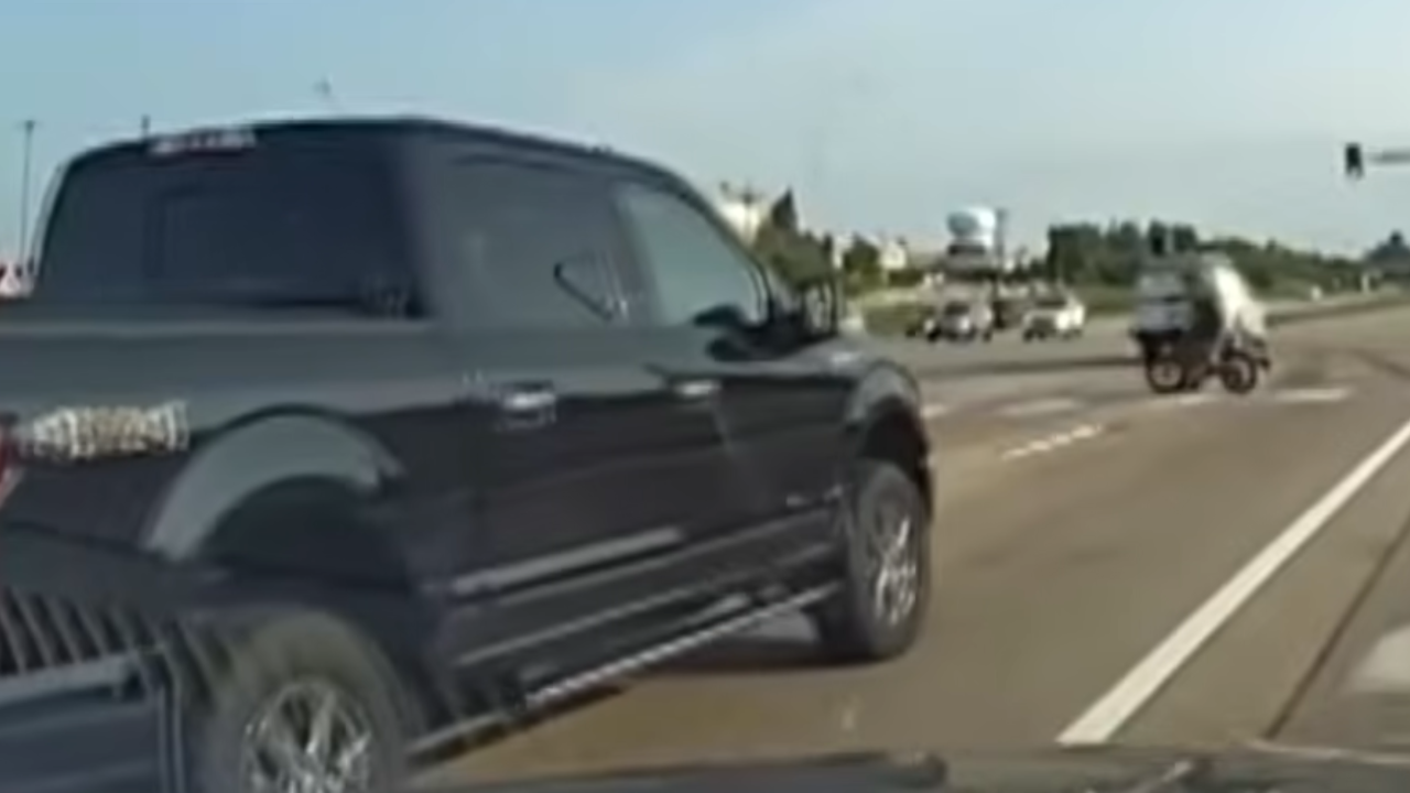 truck almost hits kid on e-bike