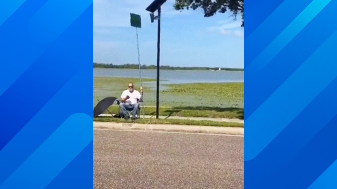 man blocks flock camera