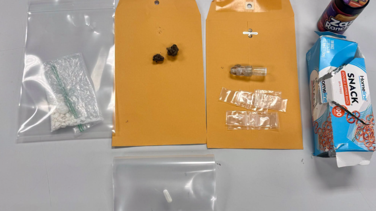 man puts drugs in teen pocket