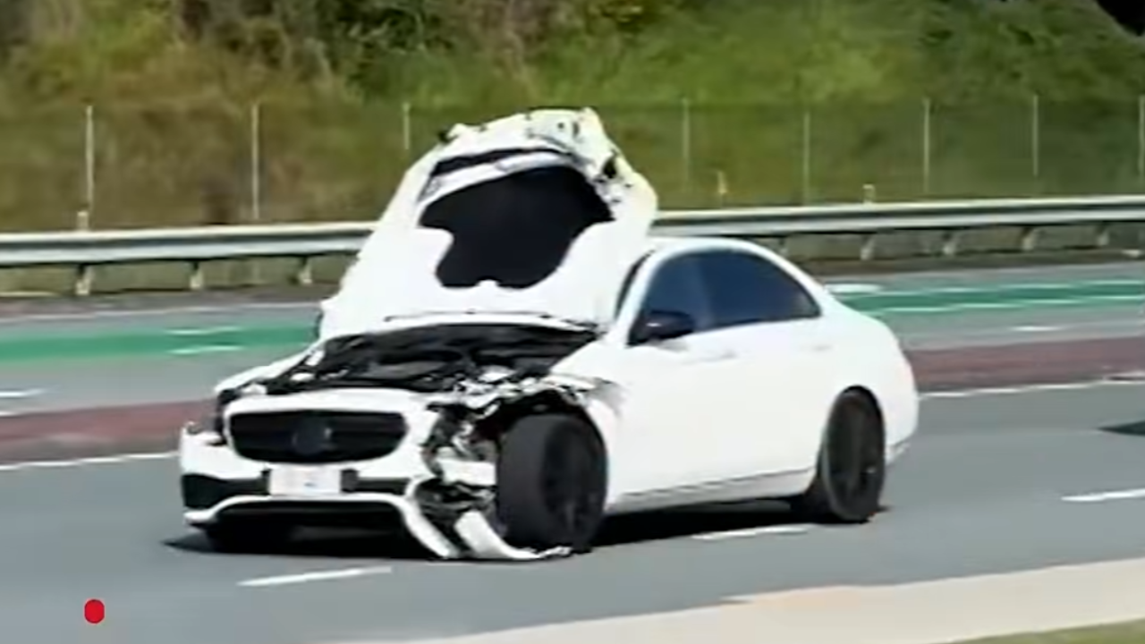 car with bonnet up runs from cops