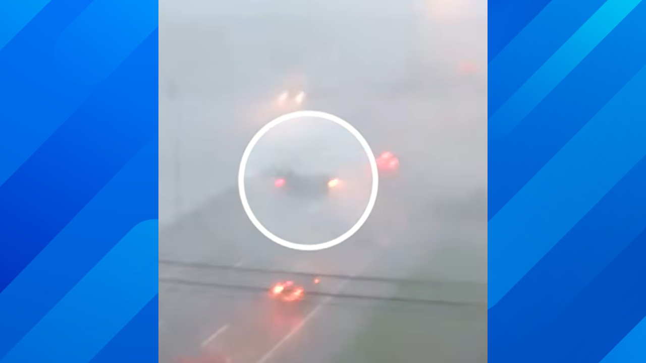Woman's car gets thrown into the air by a storm