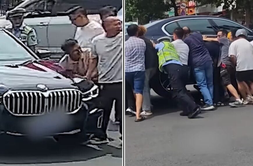 Dozens of Strangers Turn Into Heroes After Biker Gets Pinned Under BMW In Viral Video