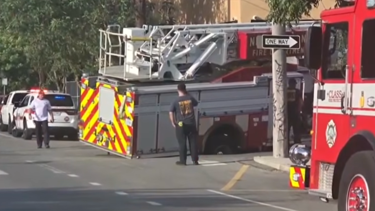 firetruck stuck in sink hole