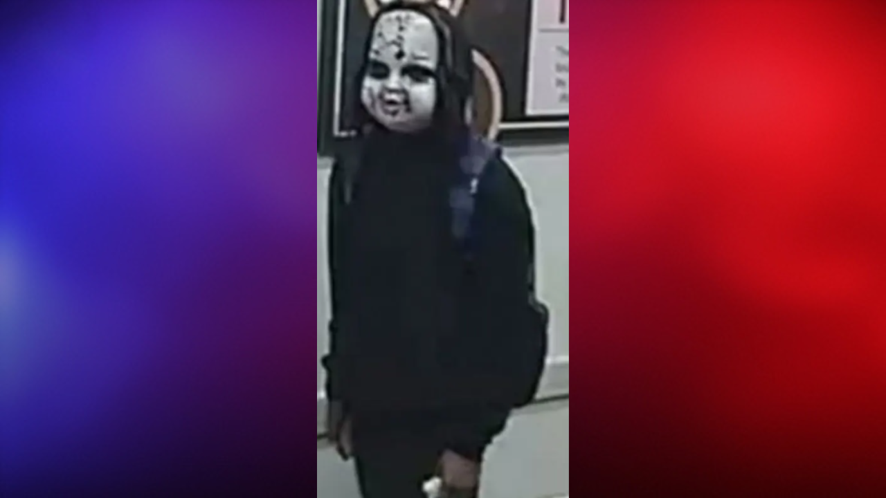 man in creepy mask chasing people