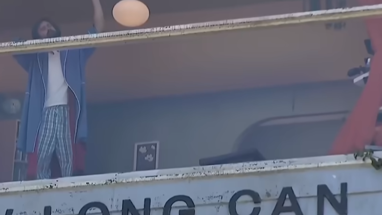 man living inside billboard